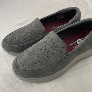Gray suede Sketchers memory foam slip-ons